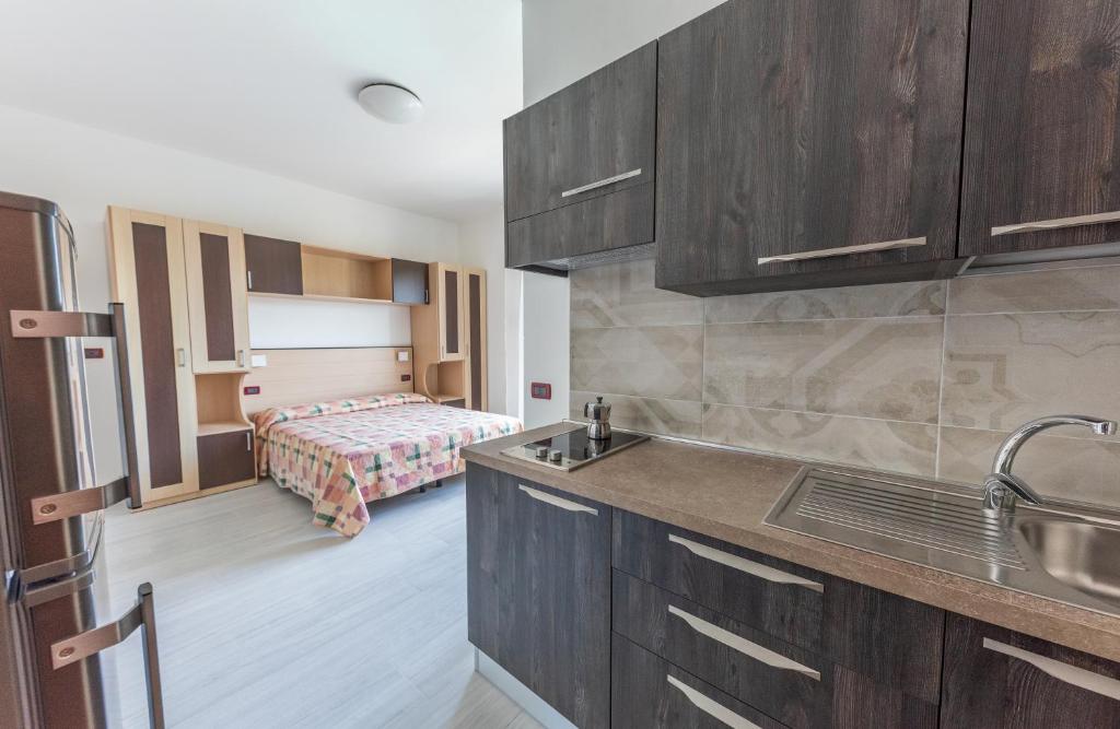 A kitchen or kitchenette at Residence Renadoro