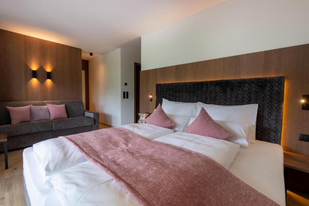 Postel nebo postele na pokoji v ubytování Garden Park Hotel