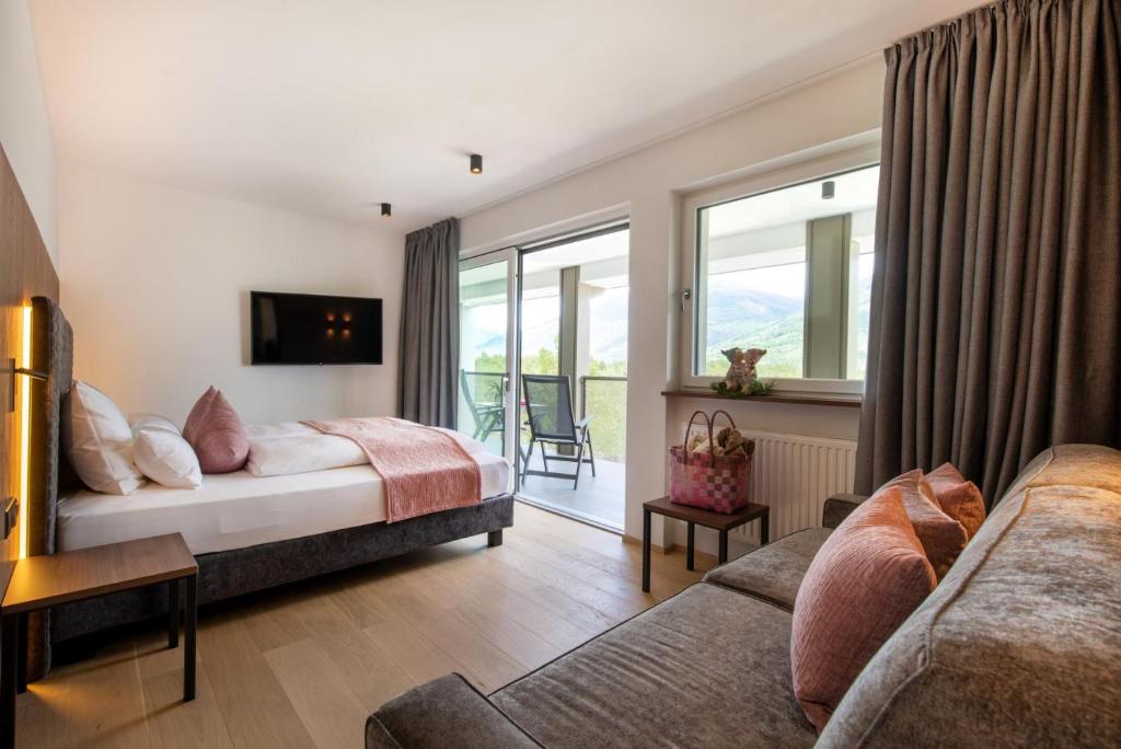 Postel nebo postele na pokoji v ubytování Garden Park Hotel