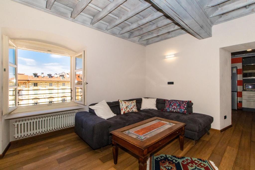 Posezení v ubytování Piazza della Repubblica Refined Apartment