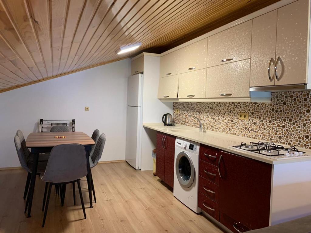 A kitchen or kitchenette at İmera Suite Otel