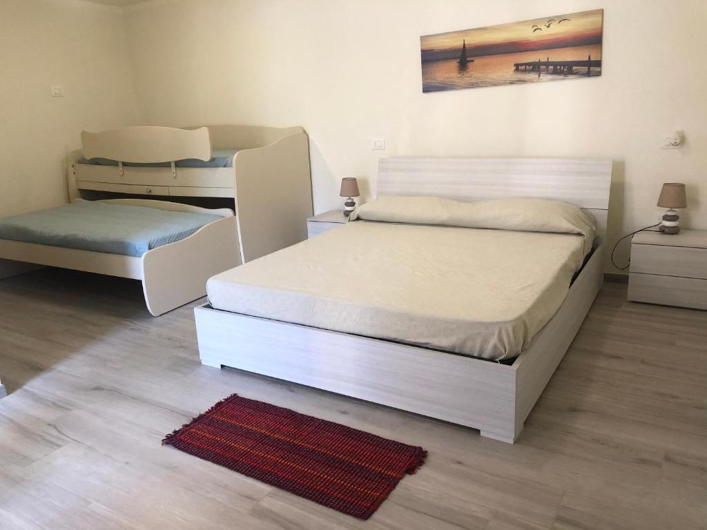 Postel nebo postele na pokoji v ubytování Da Rita