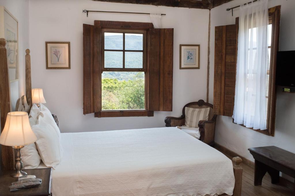 Postel nebo postele na pokoji v ubytování Pouso da Torre
