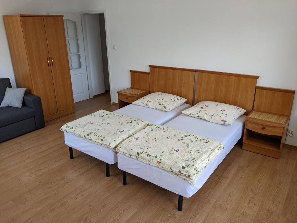 Posteľ alebo postele v izbe v ubytovaní Pokoje Gościnne - Leśna 8