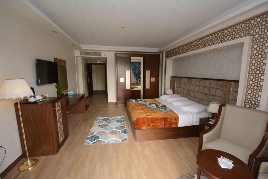 Postel nebo postele na pokoji v ubytování Nile Transport Hotel
