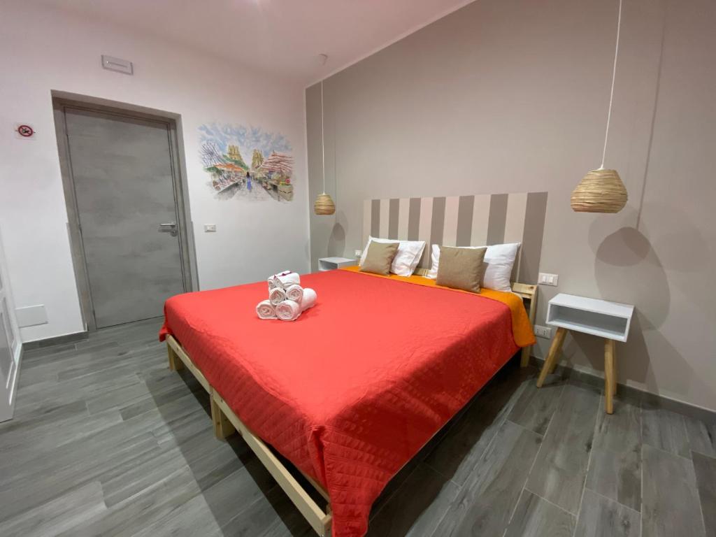 Postel nebo postele na pokoji v ubytování La Piccola Formica Charme Rooms