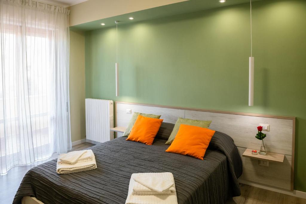 A bed or beds in a room at Bacco e Barocco
