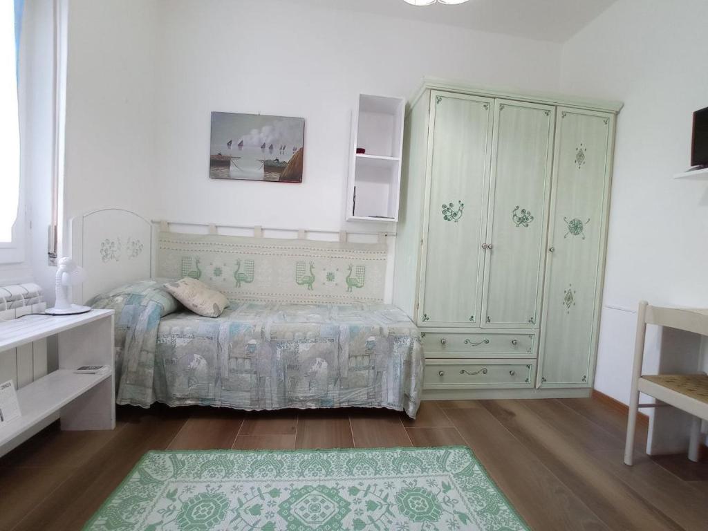 Postel nebo postele na pokoji v ubytování La Pervinca