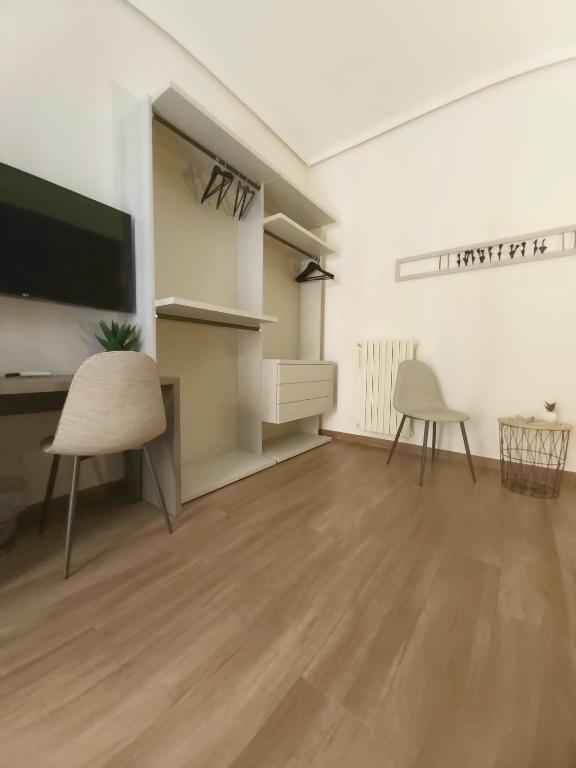 TV a/nebo společenská místnost v ubytování Bella Giulia