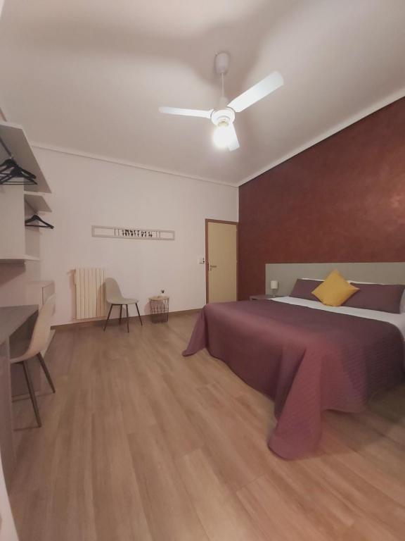 Postel nebo postele na pokoji v ubytování Bella Giulia