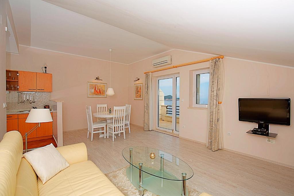 TV a/nebo společenská místnost v ubytování Big Blue Apartments