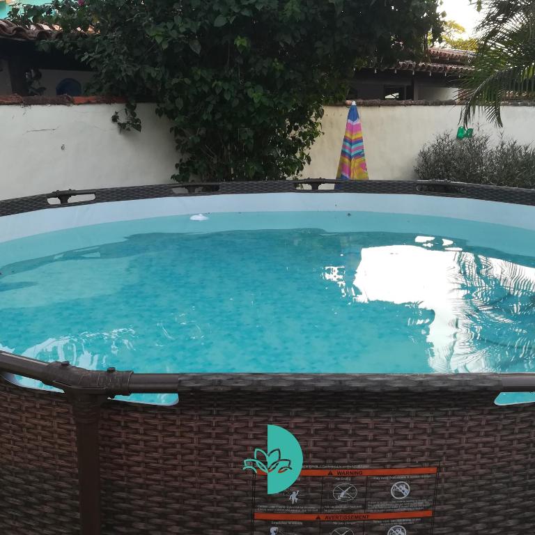  Casa 50 metros da praia de Manguinhos