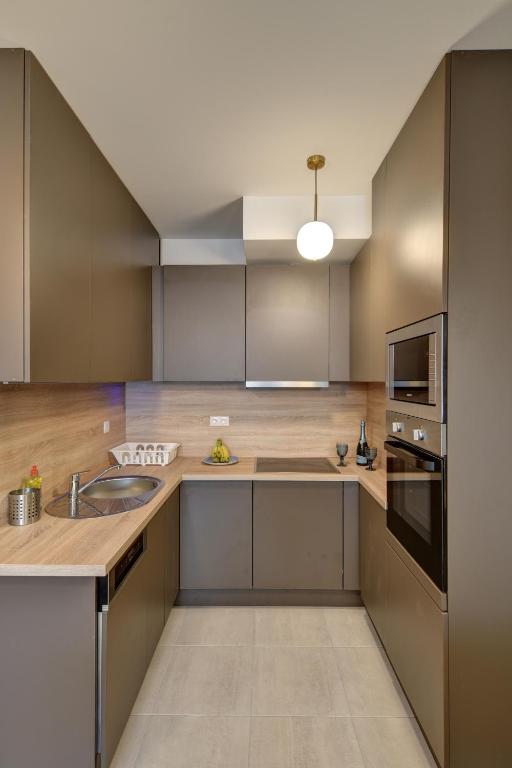 Vision Apartments Budapestにあるキッチンまたは簡易キッチン