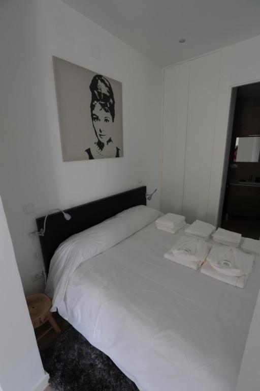 A bed or beds in a room at Las Infantas Zona Centro