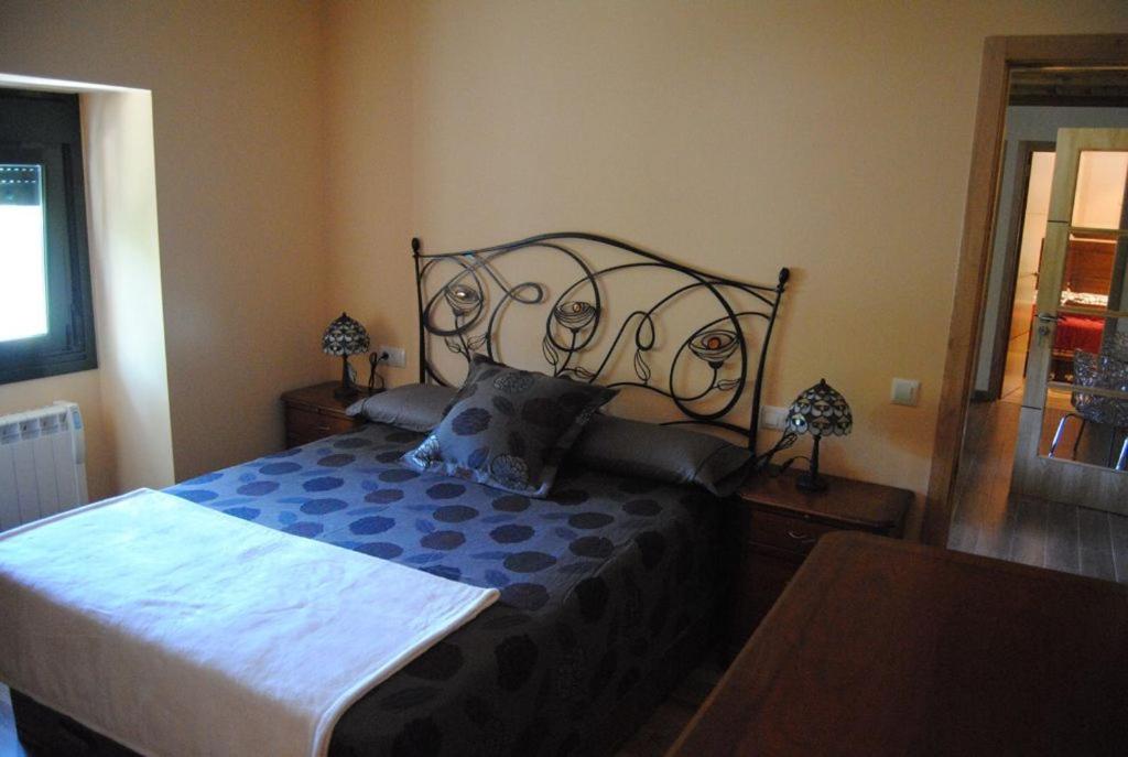 Łóżko lub łóżka w pokoju w obiekcie Villa Adilia
