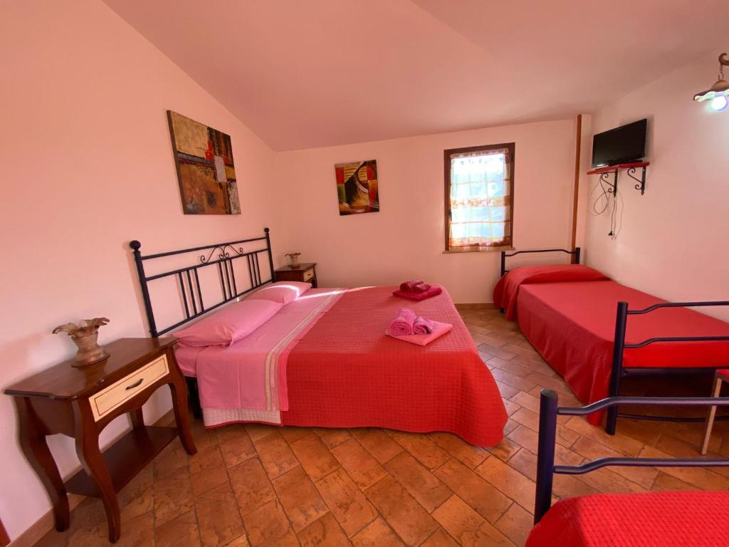 Postel nebo postele na pokoji v ubytování B&b Su Acu