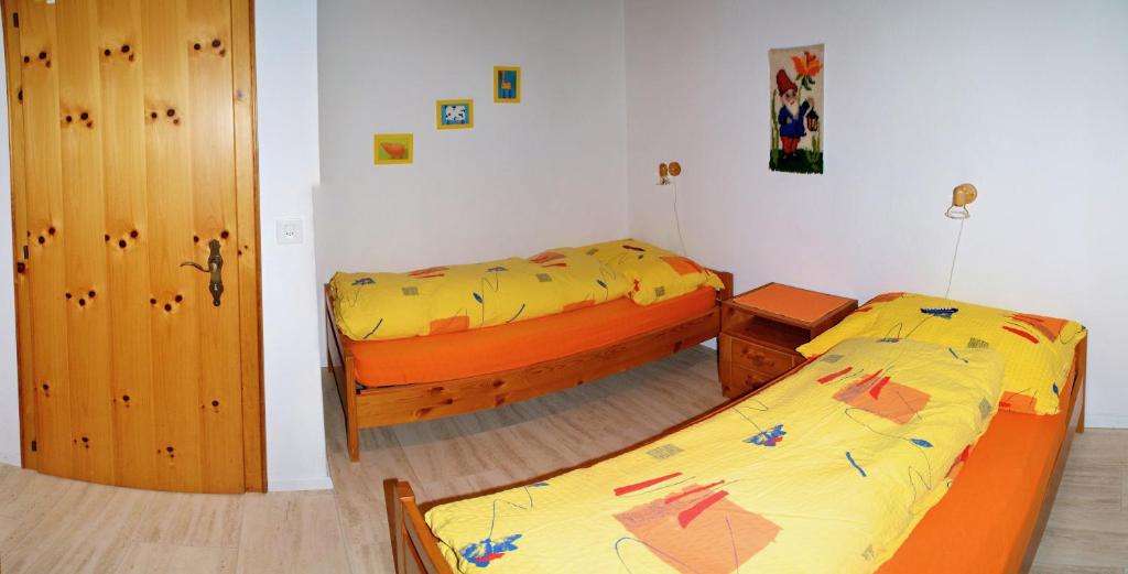 Postel nebo postele na pokoji v ubytování Haus Arolle, Bettmeralp