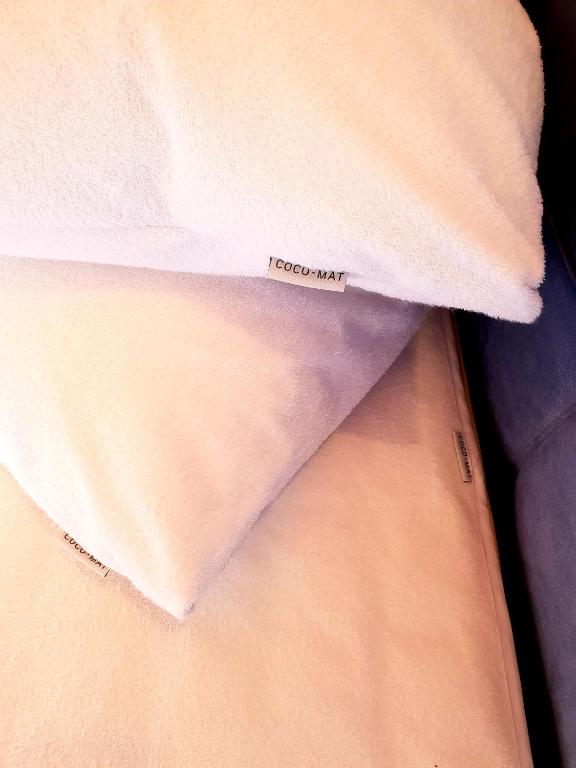 Postel nebo postele na pokoji v ubytování Reiki Villas Erikousa