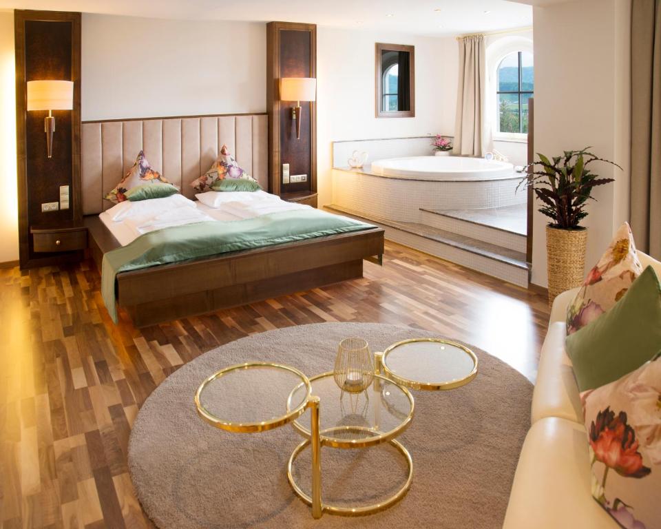 Postel nebo postele na pokoji v ubytování Hotel Restaurant Häupl