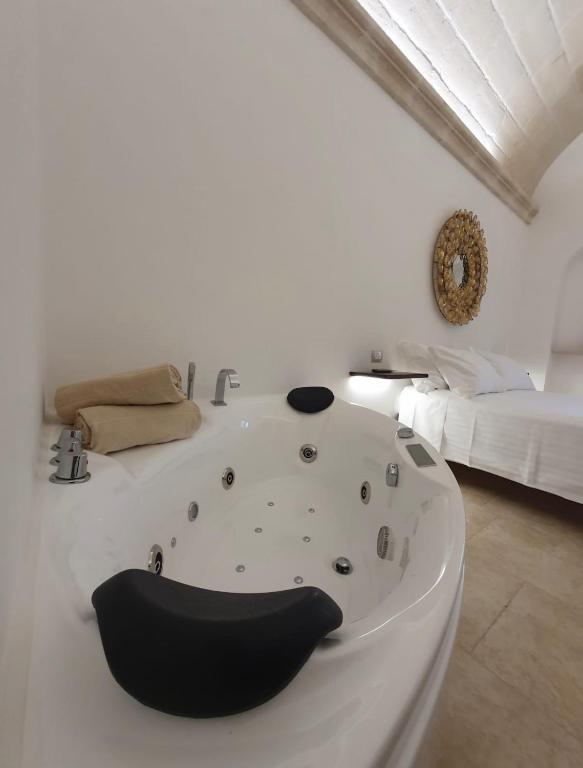 A bed or beds in a room at Sweet Home Suite
