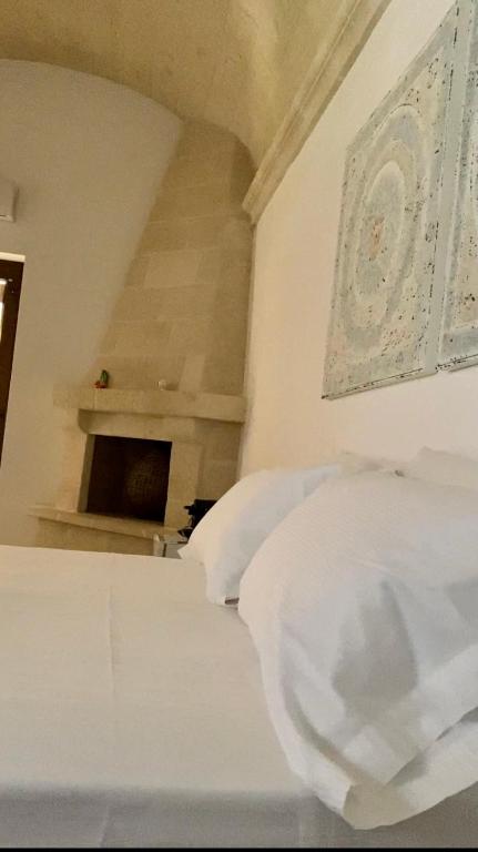 A bed or beds in a room at Sweet Home Suite