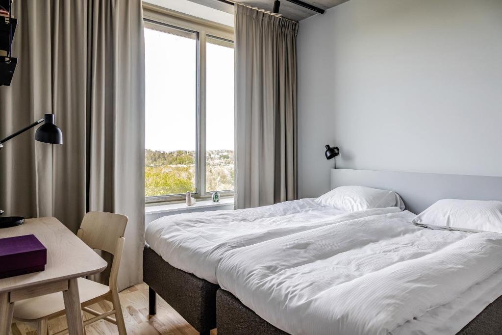 Postel nebo postele na pokoji v ubytování Comfort Hotel Solna Arenastaden