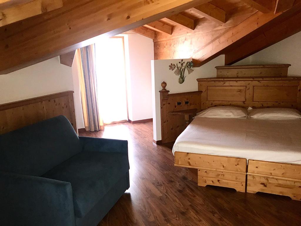 Postel nebo postele na pokoji v ubytování Hotel Mountain Resort
