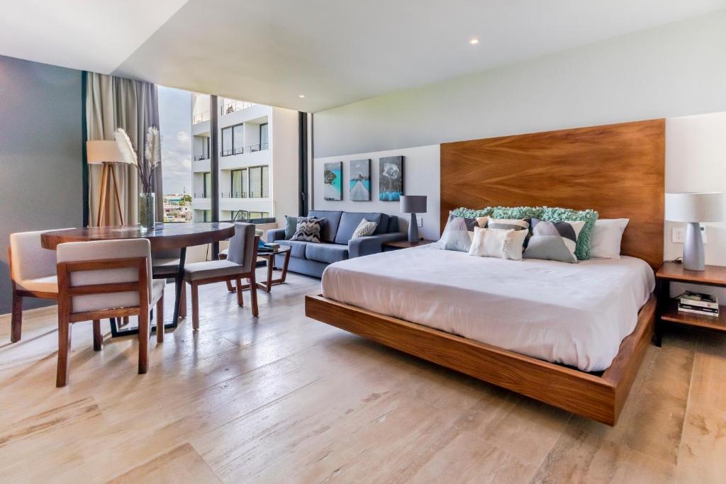 En eller flere senge i et værelse på MAGNÍFICO ESTUDIO CON ROOFTOP CERCA DE 5TA AVENIDA