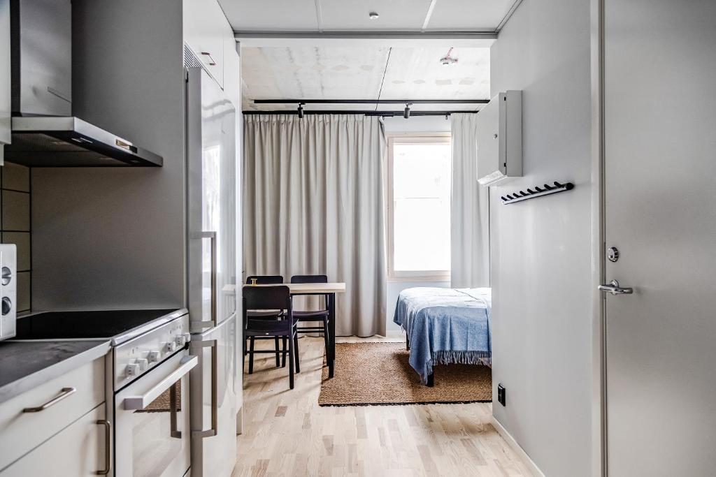 Kuchyň nebo kuchyňský kout v ubytování Comfort Hotel Solna Arenastaden