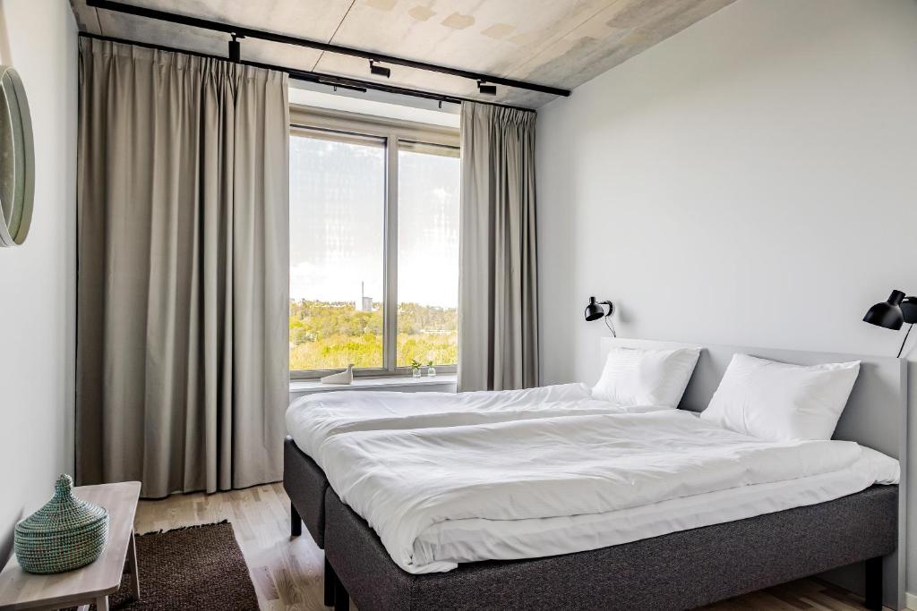 Postel nebo postele na pokoji v ubytování Comfort Hotel Solna Arenastaden