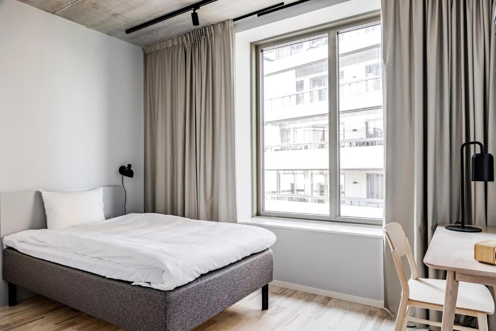 Postel nebo postele na pokoji v ubytování Comfort Hotel Solna Arenastaden