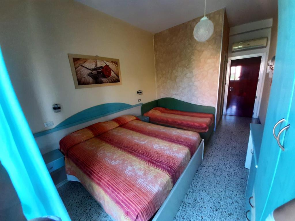 Postel nebo postele na pokoji v ubytování Hotel Prestigio