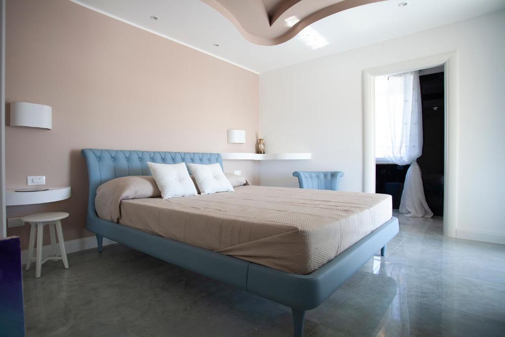 Posteľ alebo postele v izbe v ubytovaní Cavalieri D'Oro Luxury House