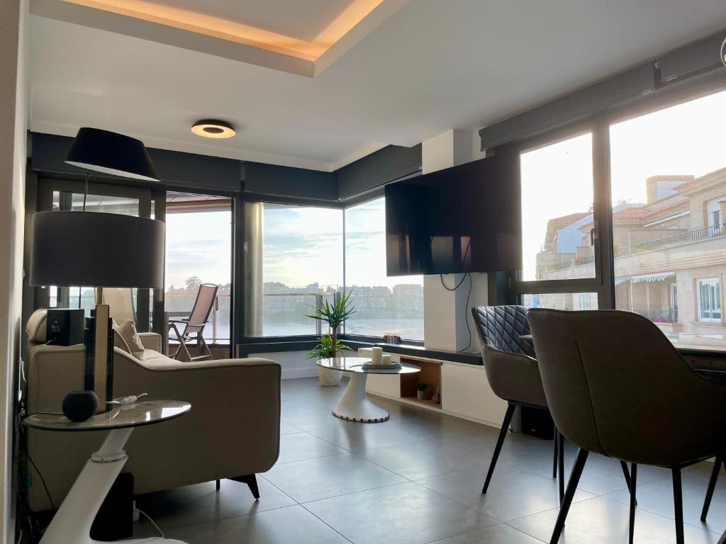 A television and/or entertainment centre at Luxury boutique playa Silgar
