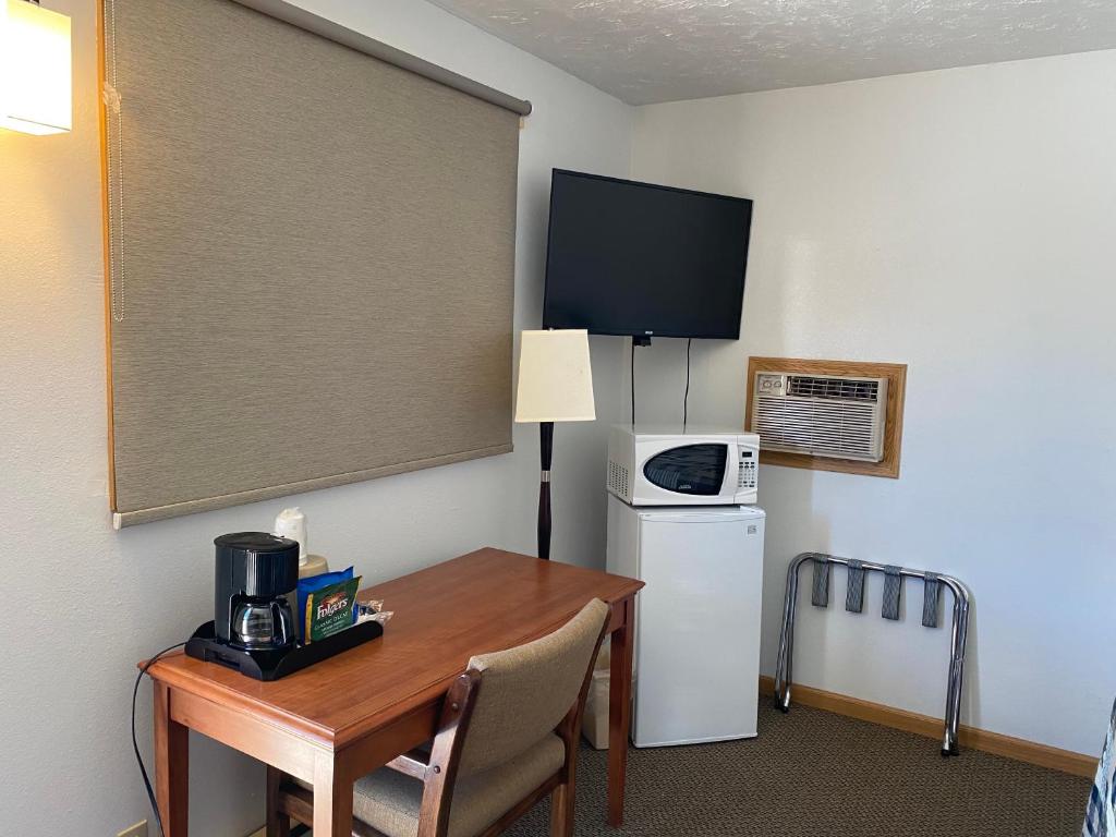 TV a/nebo společenská místnost v ubytování Holiday Lodge