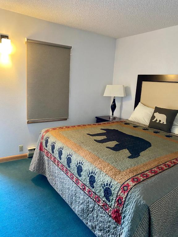 Postel nebo postele na pokoji v ubytování Holiday Lodge