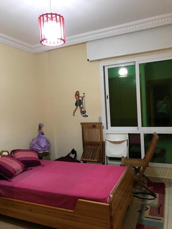 Postel nebo postele na pokoji v ubytování Cala Iris Appartement de vacances