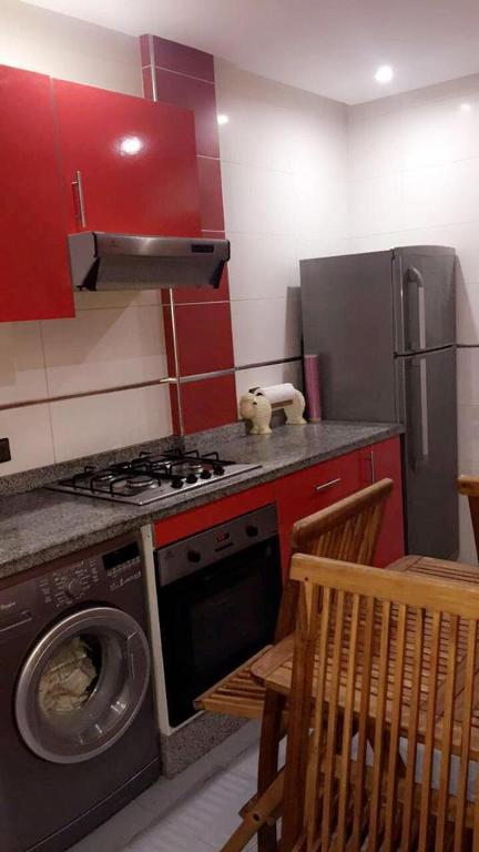 Kuchyň nebo kuchyňský kout v ubytování Cala Iris Appartement de vacances