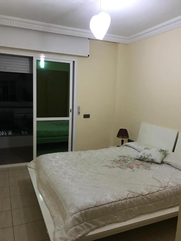 Postel nebo postele na pokoji v ubytování Cala Iris Appartement de vacances