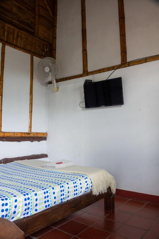 TV a/nebo společenská místnost v ubytování Ikara Hotel Campestre Villeta