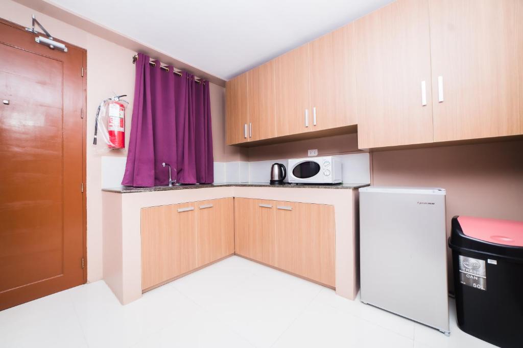 Kuchyň nebo kuchyňský kout v ubytování JSB Suites