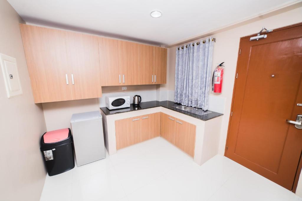 Kuchyň nebo kuchyňský kout v ubytování JSB Suites
