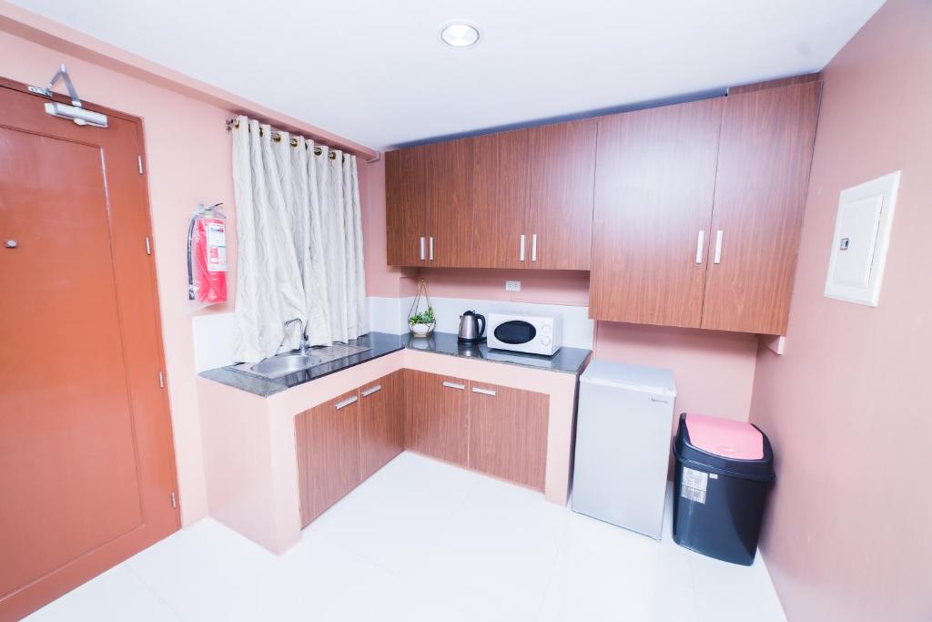 Kuchyň nebo kuchyňský kout v ubytování JSB Suites