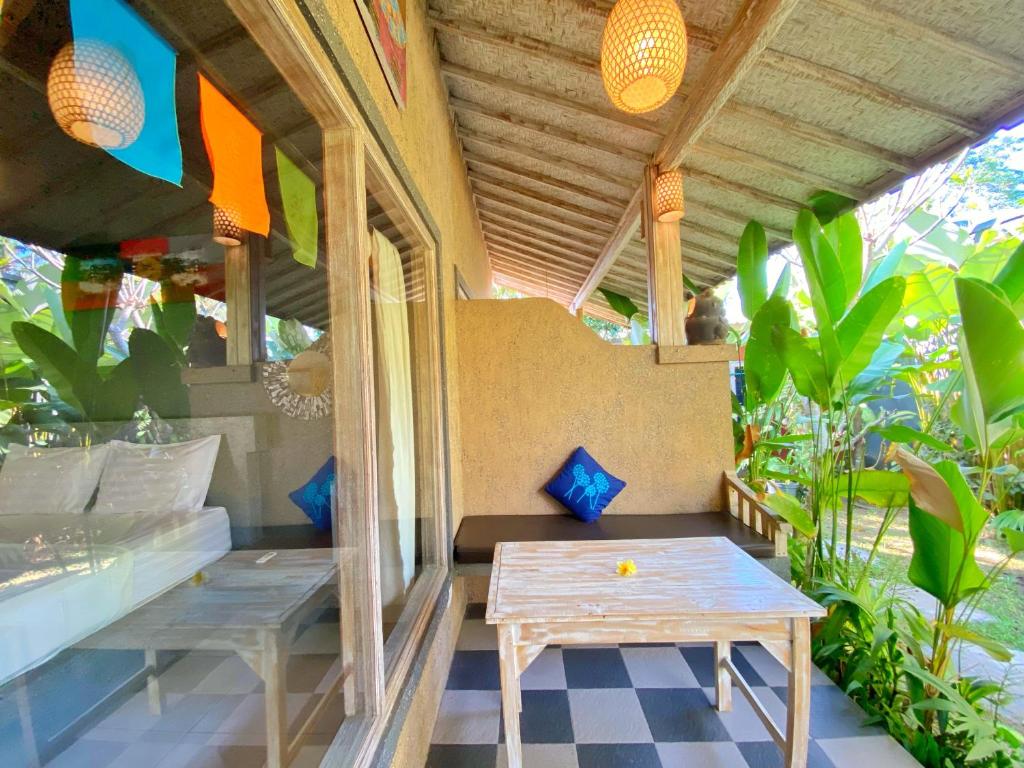 Balkón nebo terasa v ubytování Baliwid Villa Ubud