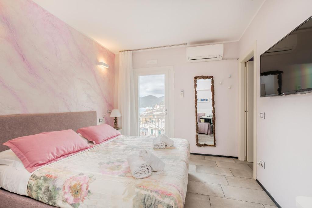 Postel nebo postele na pokoji v ubytování Casa Catò