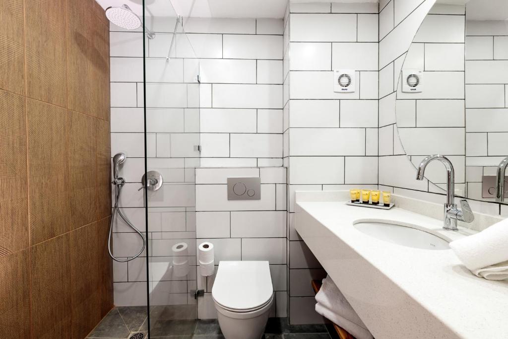 Koupelna v ubytování Ye'arim Hotel