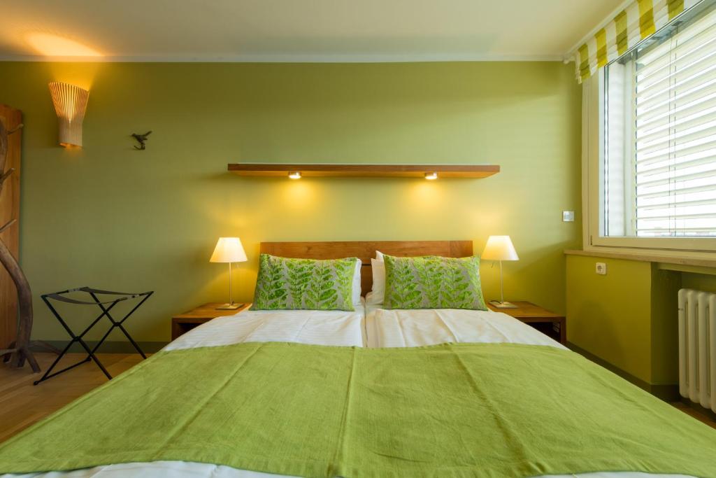 Postel nebo postele na pokoji v ubytování Hotel Viva Sky
