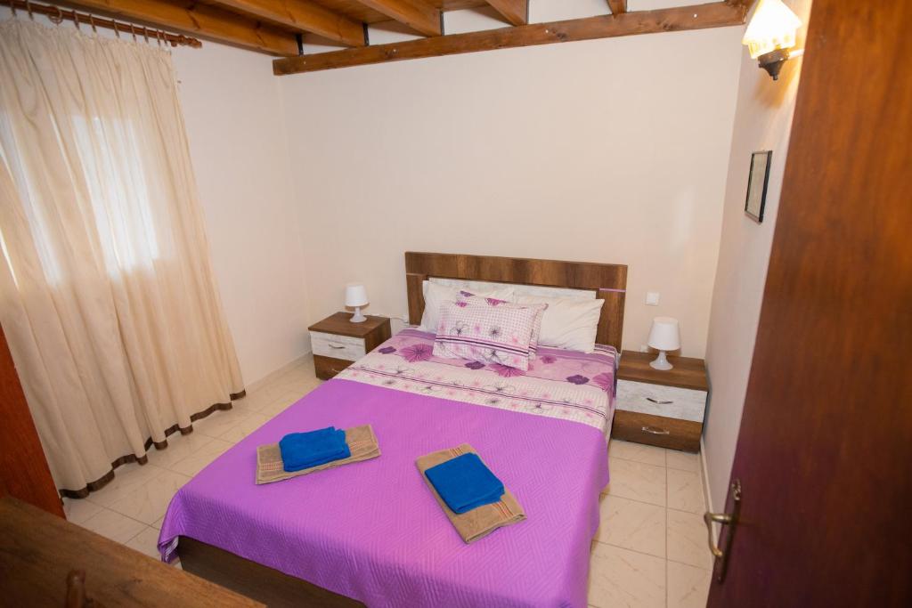 Postel nebo postele na pokoji v ubytování vila halkidiki