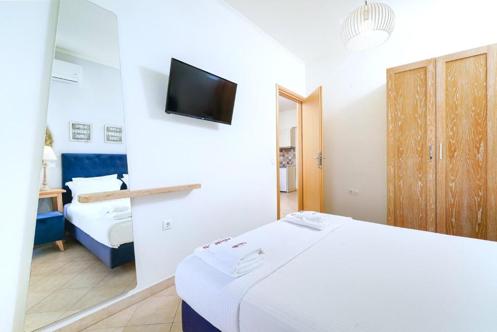 Postel nebo postele na pokoji v ubytování Aelia Villa