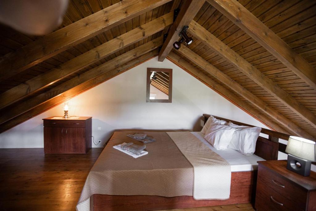 Postel nebo postele na pokoji v ubytování vila halkidiki